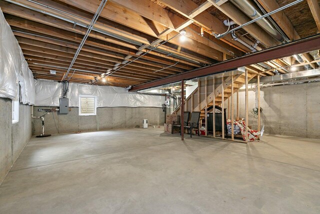11130 Alpine Ln, Orland Park, IL 60467 - below grade area featuring electric panel and stairs