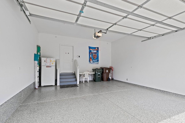 11130 Alpine Ln, Orland Park, IL 60467 - garage with freestanding refrigerator and a garage door opener