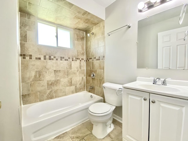 bathroom with shower / washtub combination, toilet, vanity, and baseboards