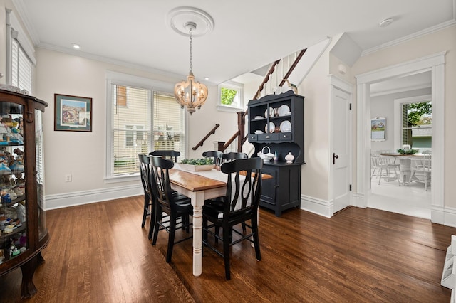 dining space with a chandelier, dark wood-type flooring, baseboards, ornamental molding, and recessed lighting