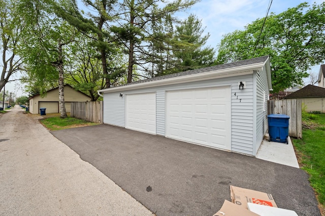 detached garage with fence