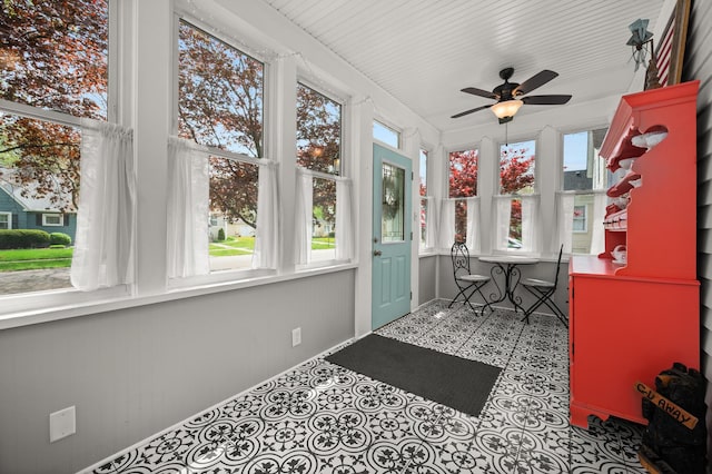 sunroom with tile patterned floors
