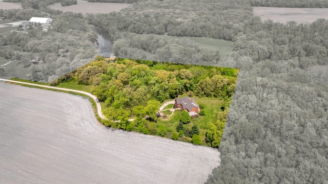drone / aerial view of a heavily wooded area