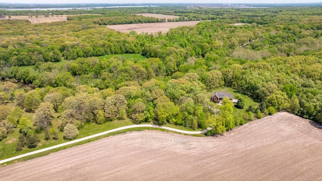 drone / aerial view of a heavily wooded area