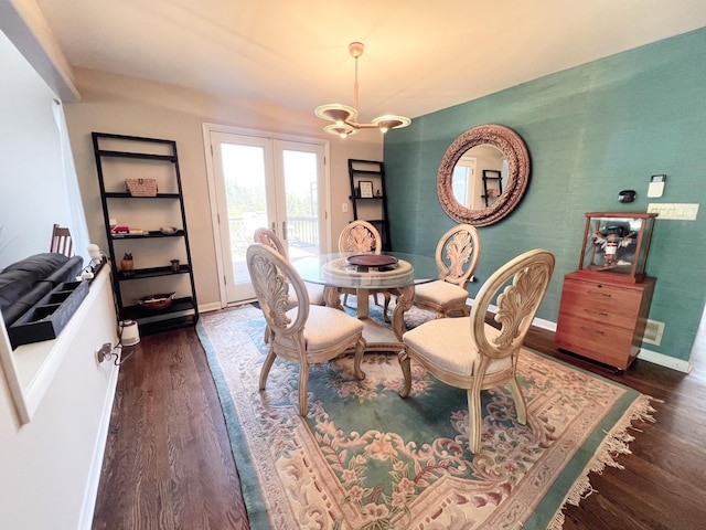 4508 Mccauley Rd, Woodstock, IL 60098 - dining room featuring dark wood-type flooring, a chandelier, french doors, and baseboards