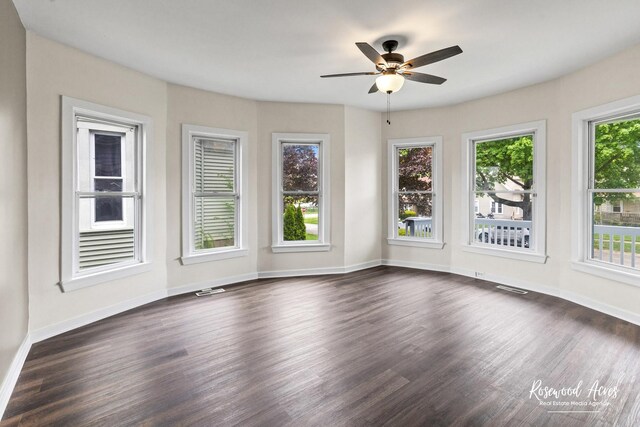 837 S 4th Ave, Kankakee, IL 60901 - unfurnished room featuring dark wood finished floors and ceiling fan