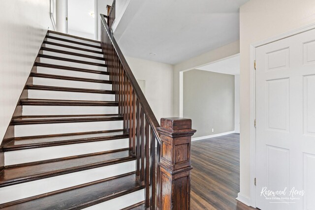 837 S 4th Ave, Kankakee, IL 60901 - staircase featuring wood finished floors and baseboards
