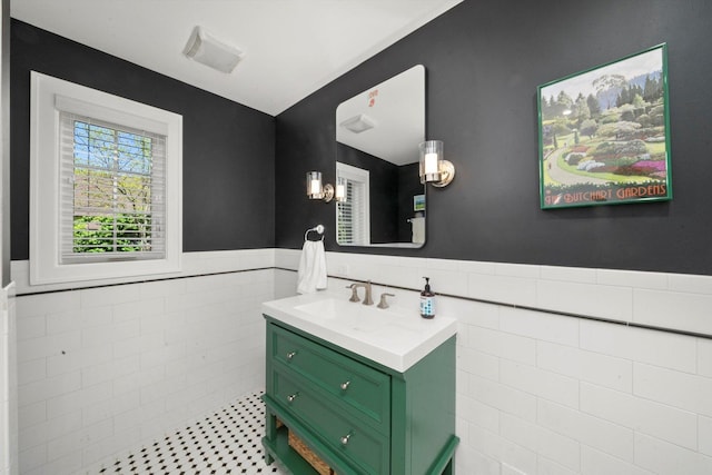 946 N Marion St, Oak Park, IL 60302 - bathroom with tile walls, a wainscoted wall, and vanity