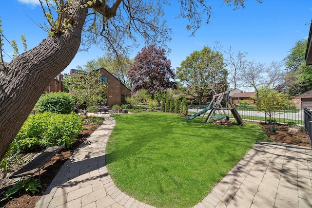 946 N Marion St, Oak Park, IL 60302 - view of yard featuring a playground and a patio