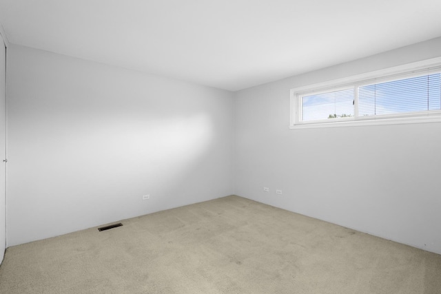 121 Cotuit Ct Unit 121, Schaumburg, IL 60193 - carpeted spare room featuring visible vents