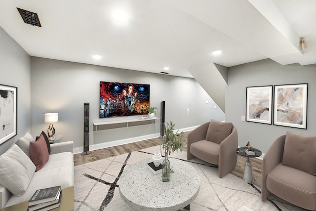 5824 N Fairfield Ave, Chicago, IL 60659 - living room with baseboards, recessed lighting, light wood-style floors, and visible vents