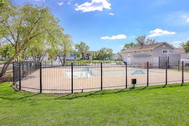 community pool with a residential view