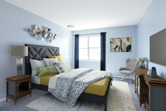 bedroom with carpet flooring and baseboards