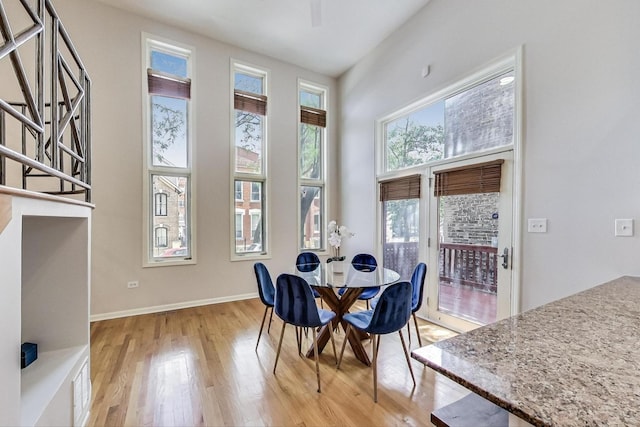 1214 N Marion Ct Unit A, Chicago, IL 60622 - dining area with light wood-style floors and baseboards