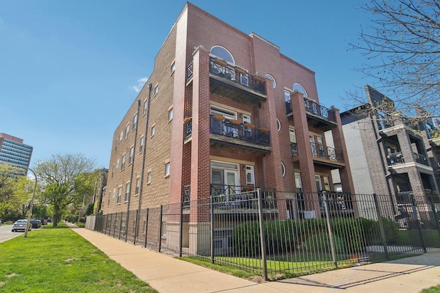 4122 S Vincennes Ave Unit 3N, Chicago, IL 60653 - view of apartment building / complex featuring fence
