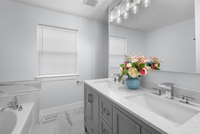 20445 Spirea Ln, Crest Hill, IL 60403 - bathroom featuring baseboards, marble finish floor, visible vents, and a sink