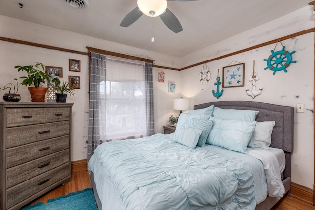 621 Marcy St, Ottawa, IL 61350 - bedroom with wood finished floors and a ceiling fan