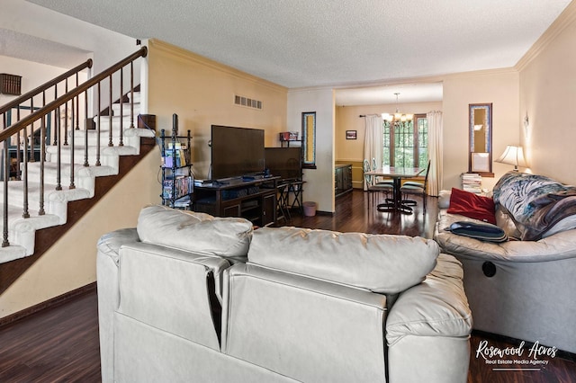 living room featuring wood finished floors, stairway, an inviting chandelier, crown molding, and baseboards