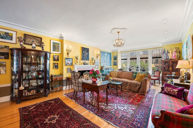 3800 N Lake Shore Dr Unit 5E, Chicago, IL 60613 - living area featuring a fireplace, crown molding, a notable chandelier, and wood finished floors