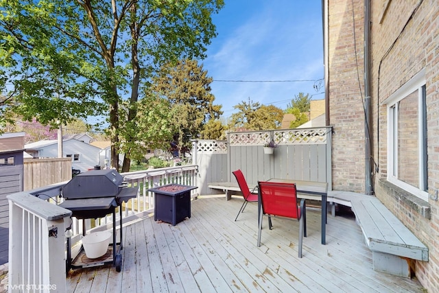 1421 Main St Unit 1421, Evanston, IL 60202 - wooden deck with outdoor dining space