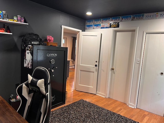 bedroom with recessed lighting and light wood-type flooring