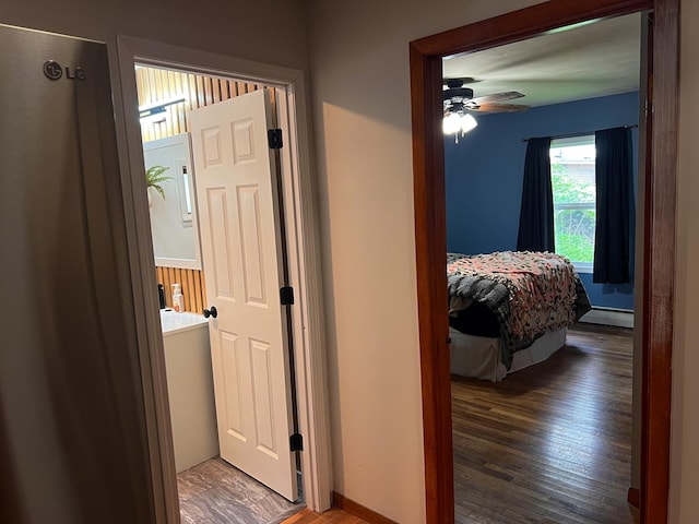 hallway featuring wood finished floors