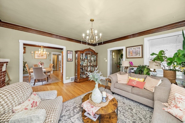 1306 Highland Ave, Berwyn, IL 60402 - living area with a chandelier, light wood-type flooring, and crown molding