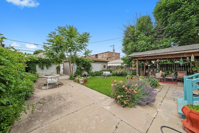 1306 Highland Ave, Berwyn, IL 60402 - fenced backyard featuring a patio area, outdoor dining space, an outdoor structure, and a gazebo