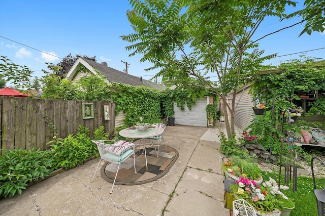 1306 Highland Ave, Berwyn, IL 60402 - view of patio / terrace featuring a garage