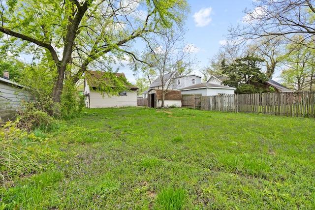 14955 Riverside Dr, South Holland, IL 60473 - view of yard with an outdoor structure, fence, and a shed