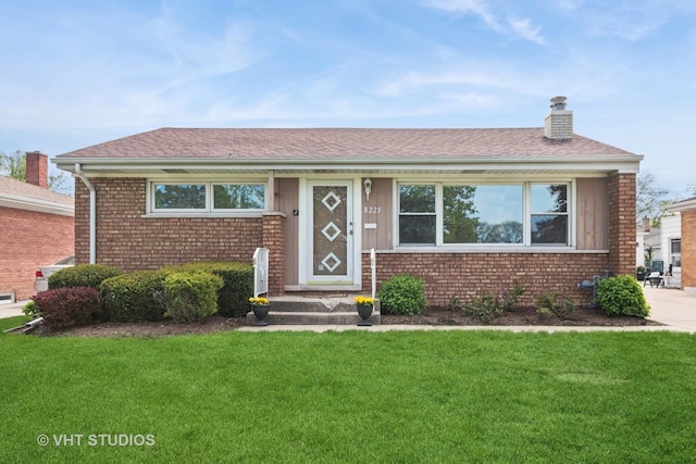 8223 N Washington St, Niles, IL 60714 - view of front of home with brick siding, a front lawn, a chimney, and a shingled roof