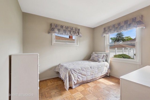 8223 N Washington St, Niles, IL 60714 - bedroom featuring multiple windows and baseboards