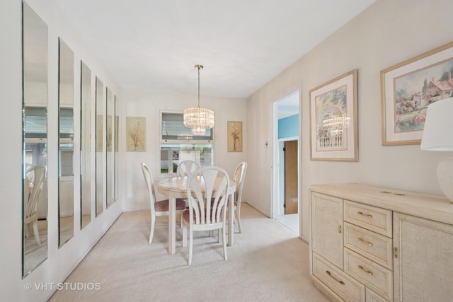 8223 N Washington St, Niles, IL 60714 - dining room featuring a chandelier and light carpet