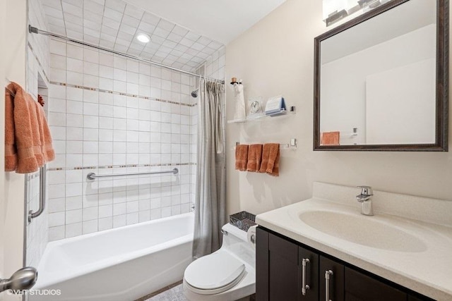 bathroom with vanity, toilet, and shower / bath combo