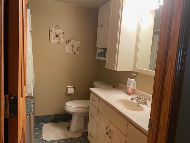 300 Marquette Ln, Spring Valley, IL 61362 - bathroom with tile patterned flooring, vanity, and toilet
