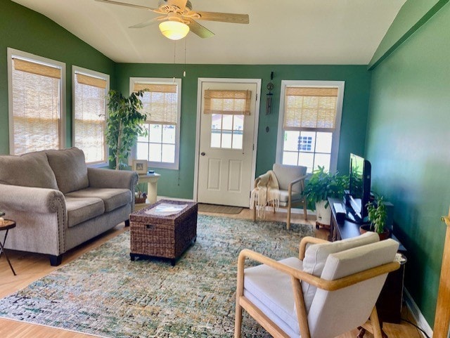 300 Marquette Ln, Spring Valley, IL 61362 - living area featuring lofted ceiling, wood finished floors, and a ceiling fan