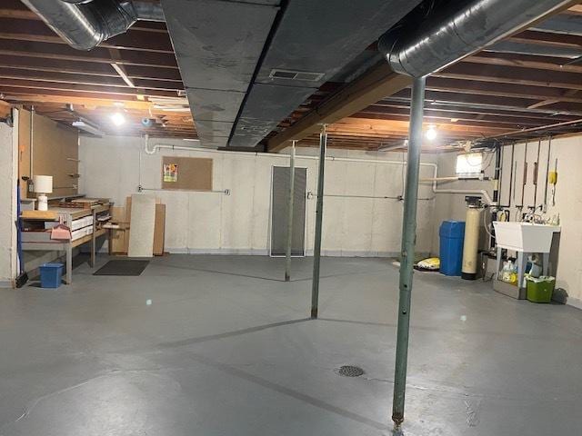300 Marquette Ln, Spring Valley, IL 61362 - basement with a water softener system and a sink