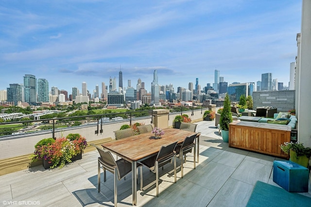 900 N Kingsbury St Unit 1150, Chicago, IL 60610 - view of patio / terrace featuring a skyline view and outdoor dining area