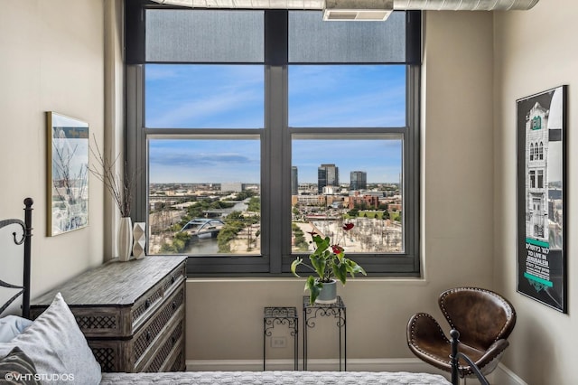 900 N Kingsbury St Unit 1150, Chicago, IL 60610 - living area featuring a view of city and baseboards