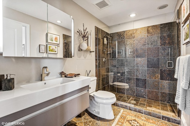 900 N Kingsbury St Unit 1150, Chicago, IL 60610 - full bath featuring toilet, a tile shower, vanity, and recessed lighting