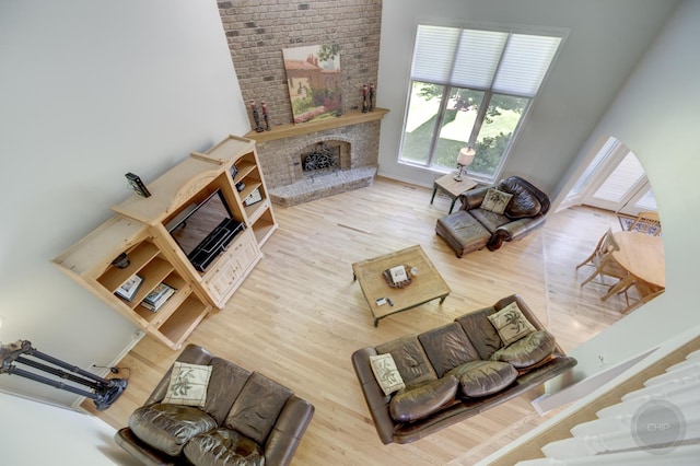 2411 Williamstown Ct, Naperville, IL 60564 - living room featuring wood finished floors and a fireplace