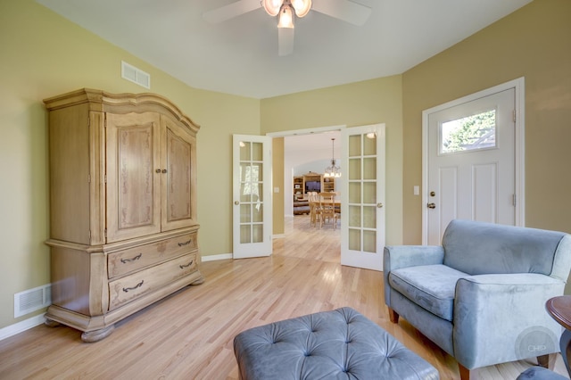 2411 Williamstown Ct, Naperville, IL 60564 - living area with french doors, light wood-type flooring, ceiling fan, and baseboards