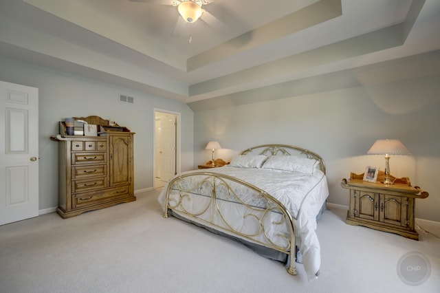 2411 Williamstown Ct, Naperville, IL 60564 - carpeted bedroom featuring a tray ceiling, baseboards, and ceiling fan