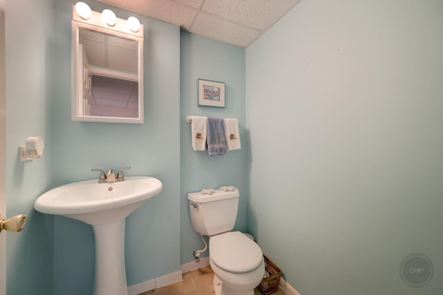 2411 Williamstown Ct, Naperville, IL 60564 - bathroom with toilet, tile patterned floors, a paneled ceiling, baseboards, and a sink