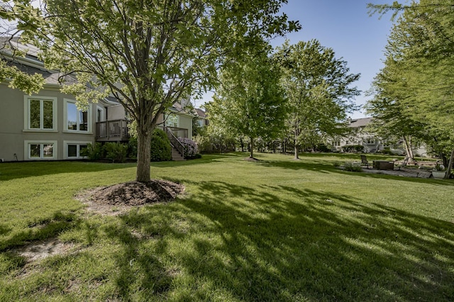 2411 Williamstown Ct, Naperville, IL 60564 - view of grassy yard featuring a wooden deck and stairs