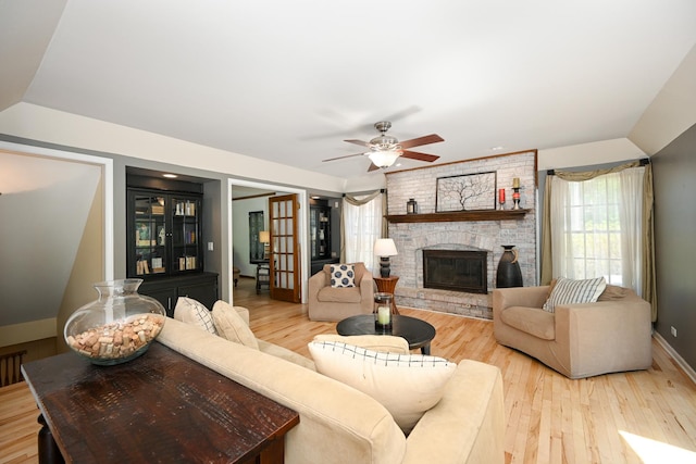 1408 Ambleside Cir, Naperville, IL 60540 - living area featuring a large fireplace, light wood-style floors, and a ceiling fan