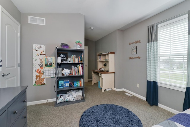 carpeted bedroom featuring visible vents, baseboards, and lofted ceiling