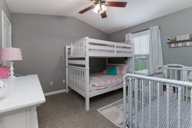 bedroom featuring lofted ceiling, baseboards, ceiling fan, and carpet floors