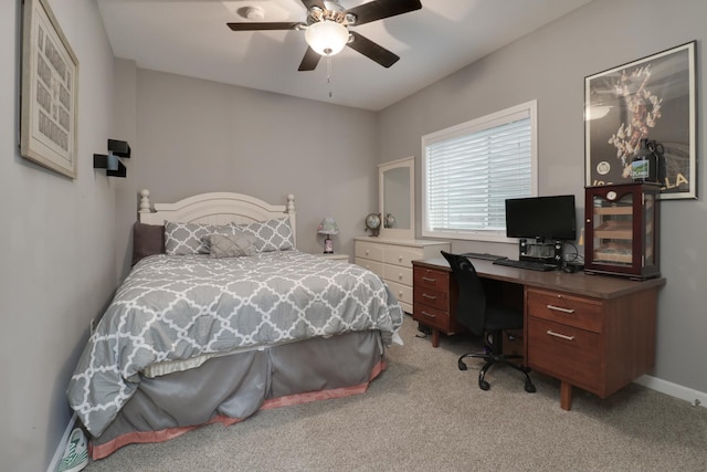 bedroom with light colored carpet and ceiling fan