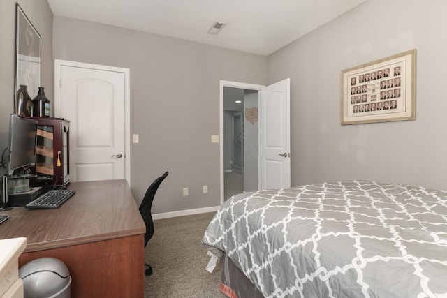 carpeted bedroom with baseboards and visible vents